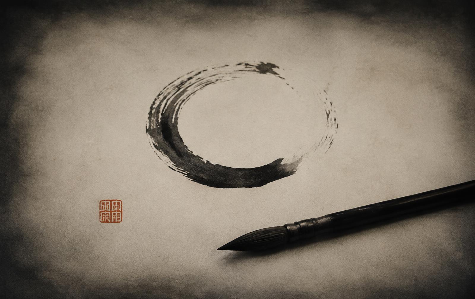 An unfinished ensō circle in black ink